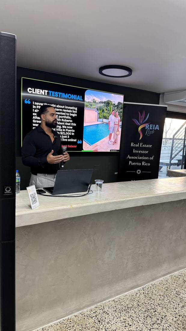Roberto presenting to investors in front of a screen