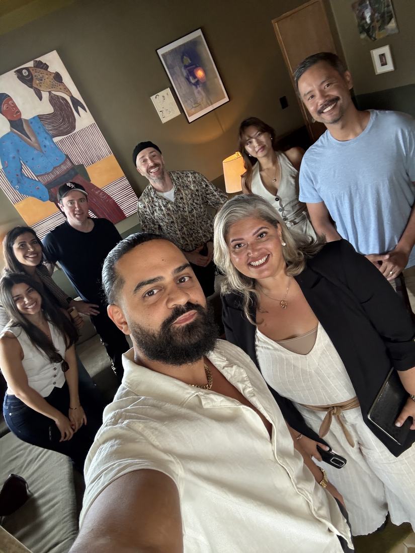 Roberto with a group of investors at an event
