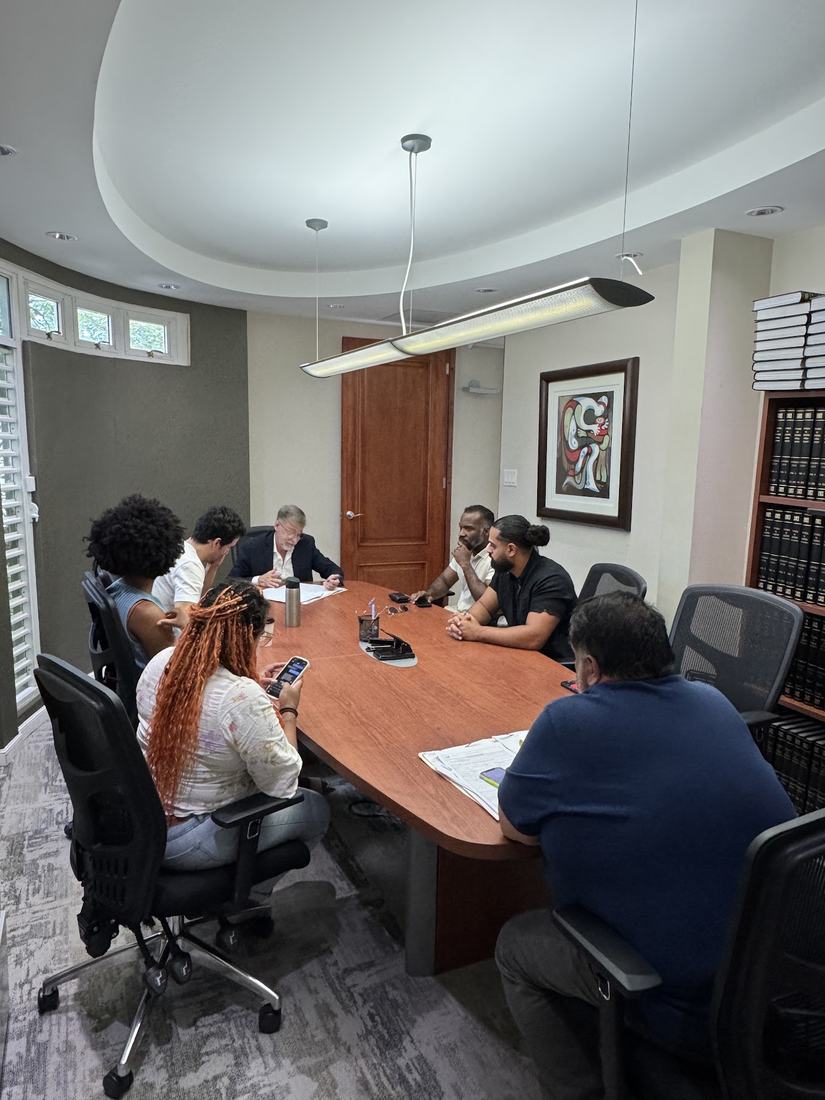 A closing meeting around a conference table